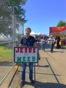 Jesus is Love at Seattle hempfest signs